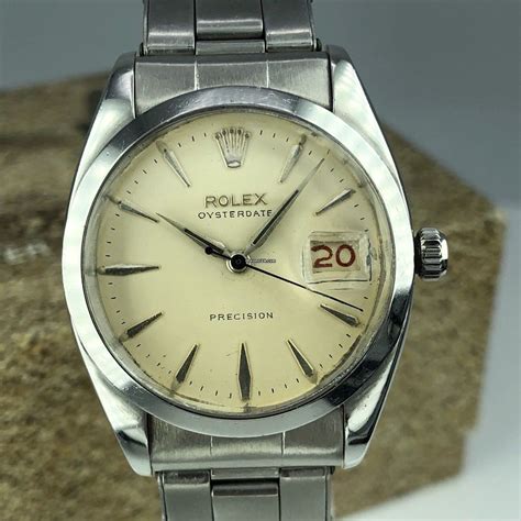 1960 rolex oysterdate black gold dial|rolex oysterdate 6694 gold.